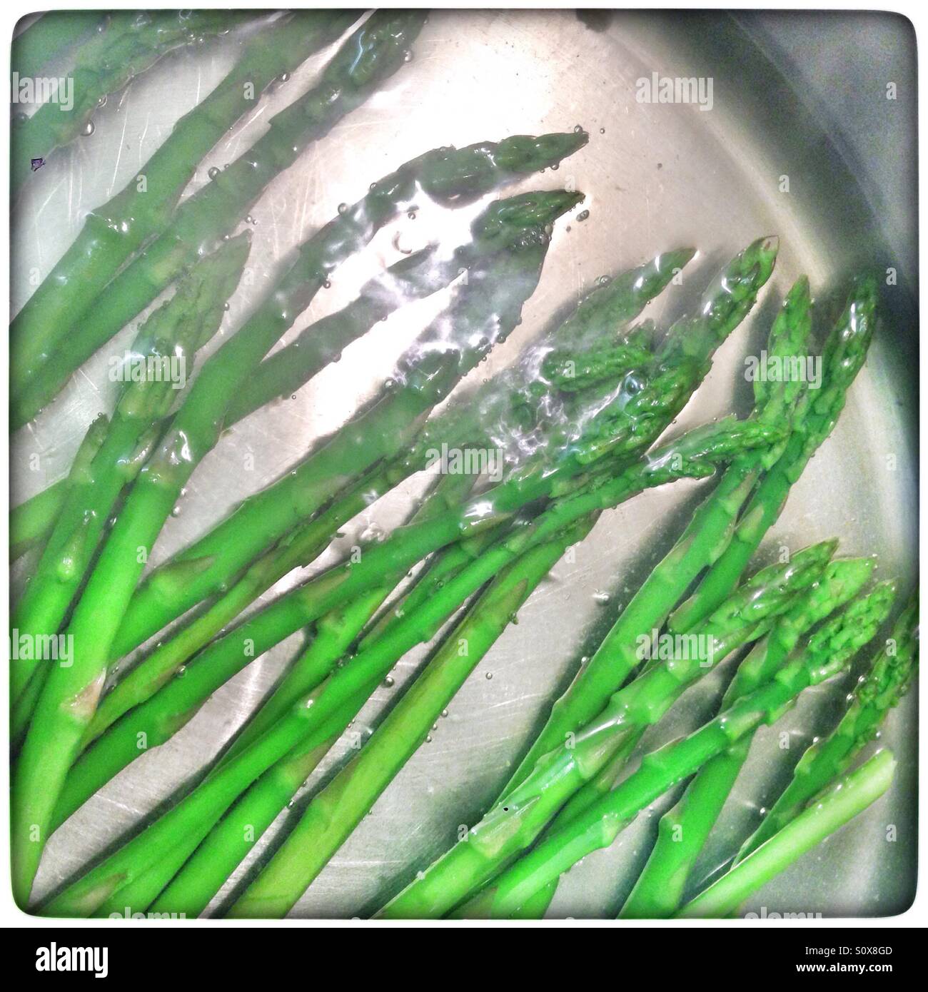 Gli asparagi spears per la cottura Foto Stock