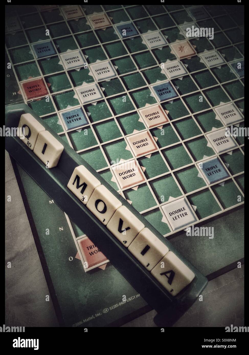 Scrabble casuale di piastrelle. Foto Stock