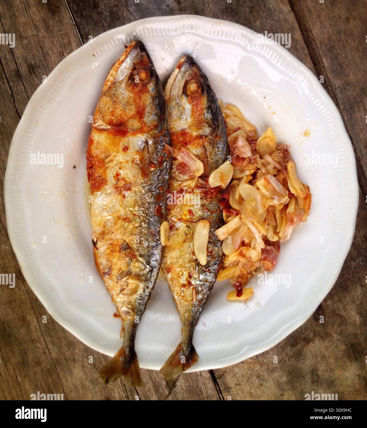 Semplice cucinare il pesce salato Foto Stock