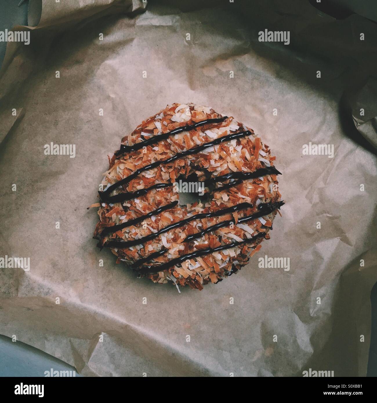 Il Cocco tostato ciambella al cioccolato Foto Stock