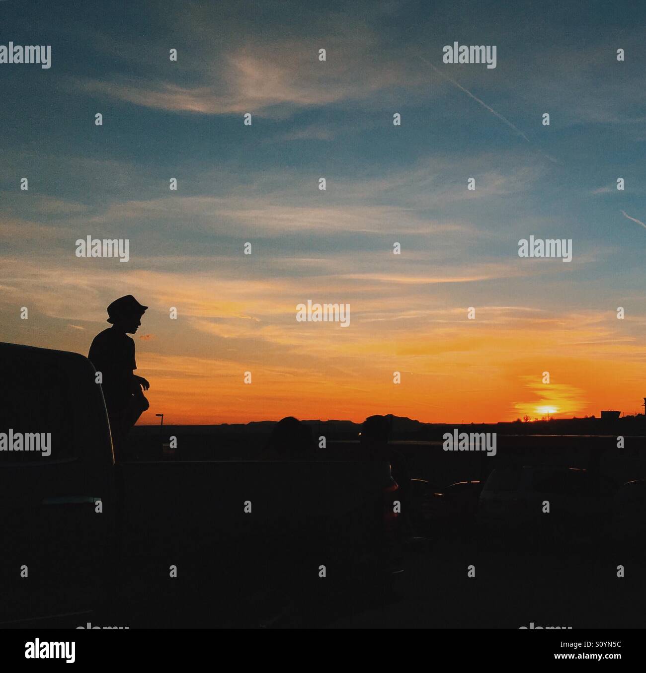 Guardando il tramonto Foto Stock