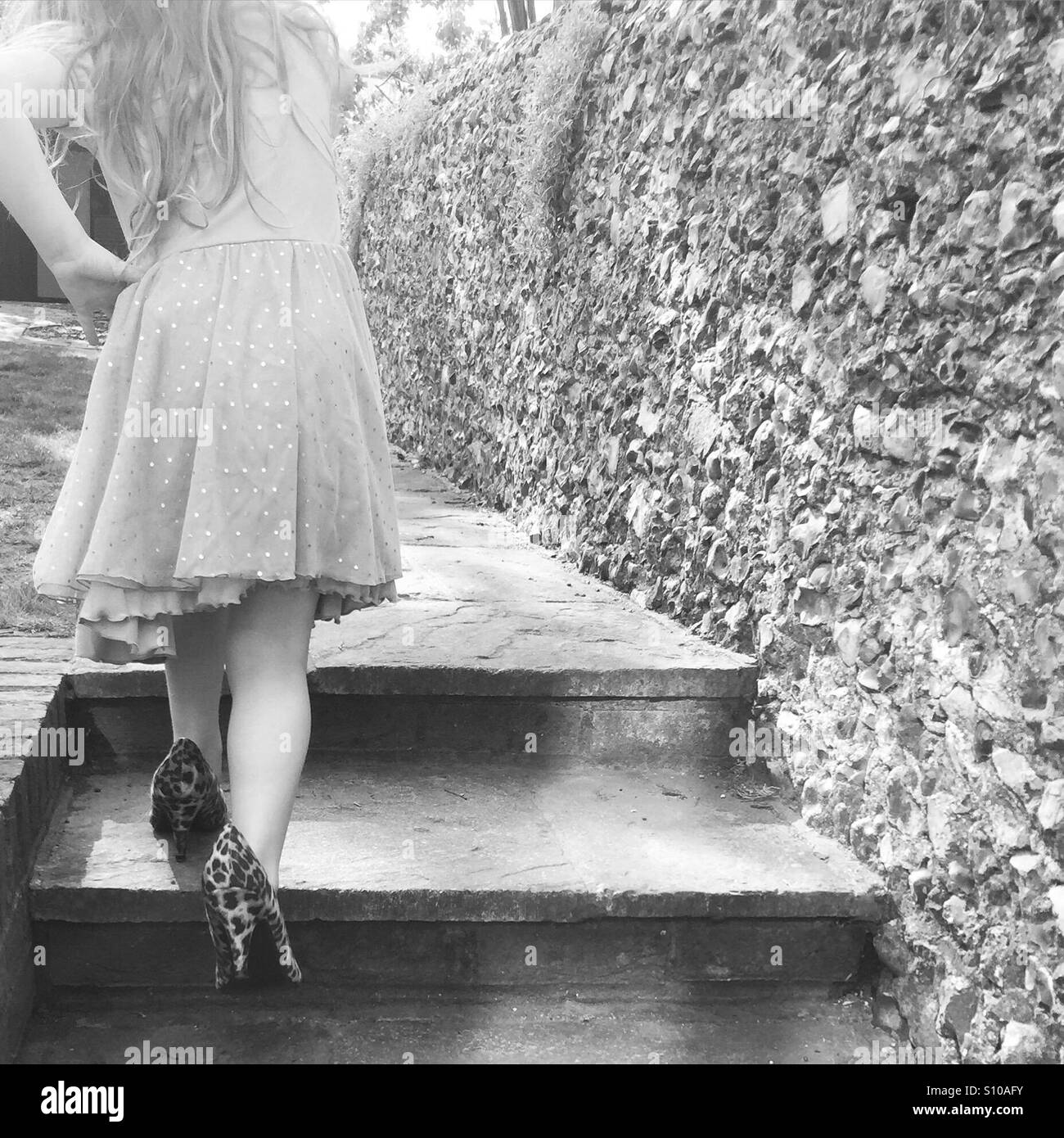 Vestirsi in bianco e nero Foto Stock