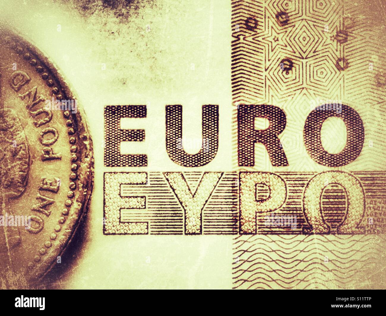Una libbra di moneta e banconota in Euro. - Immagine stock catturata con smartphone