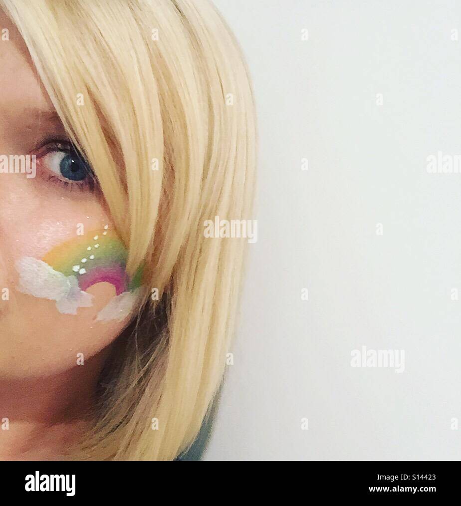 Rainbow facepaint Foto Stock