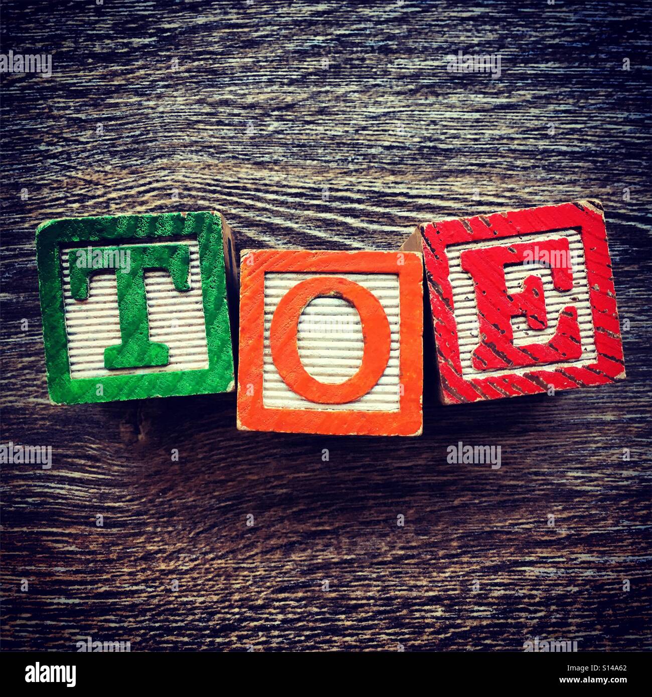 TOE parola scritta con il blocchetto di legno caratteri Foto Stock