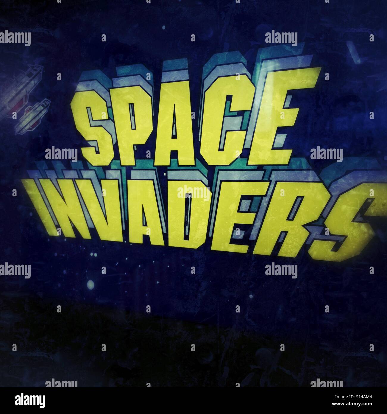 Un vintage space invaders arcade game logo Foto Stock