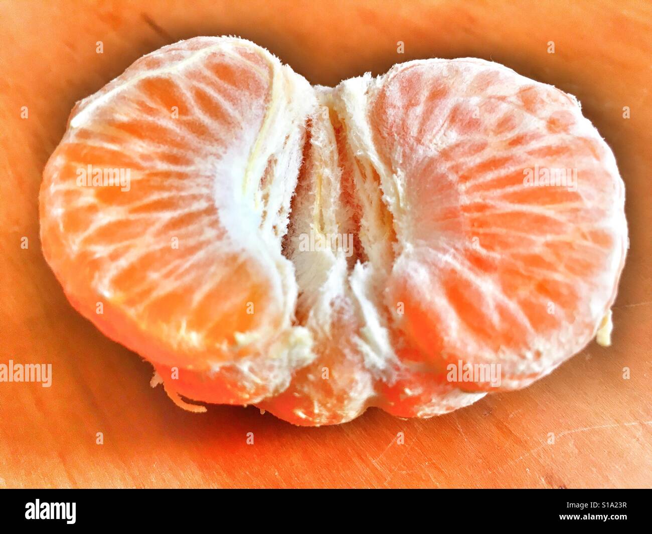 Mandarino, pelati e pronto a mangiare Foto Stock