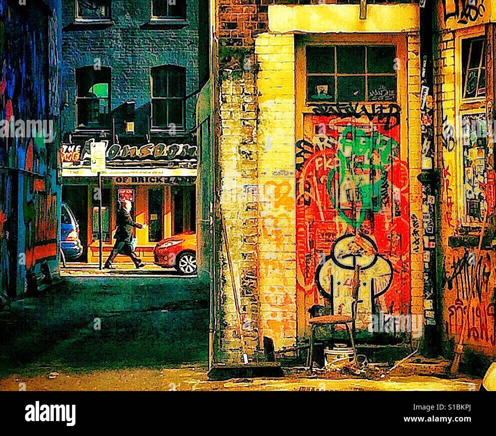Arte di strada sulle pareti degli edifici in Brick Lane, London, Regno Unito Foto Stock