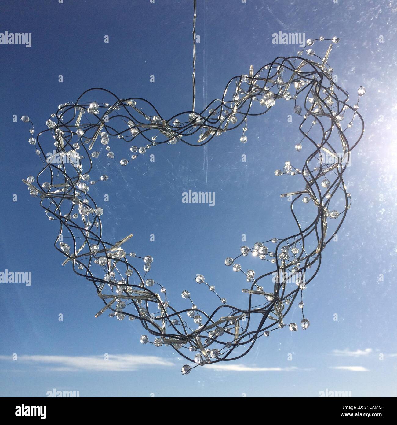 Una a forma di cuore display illuminazione Foto Stock