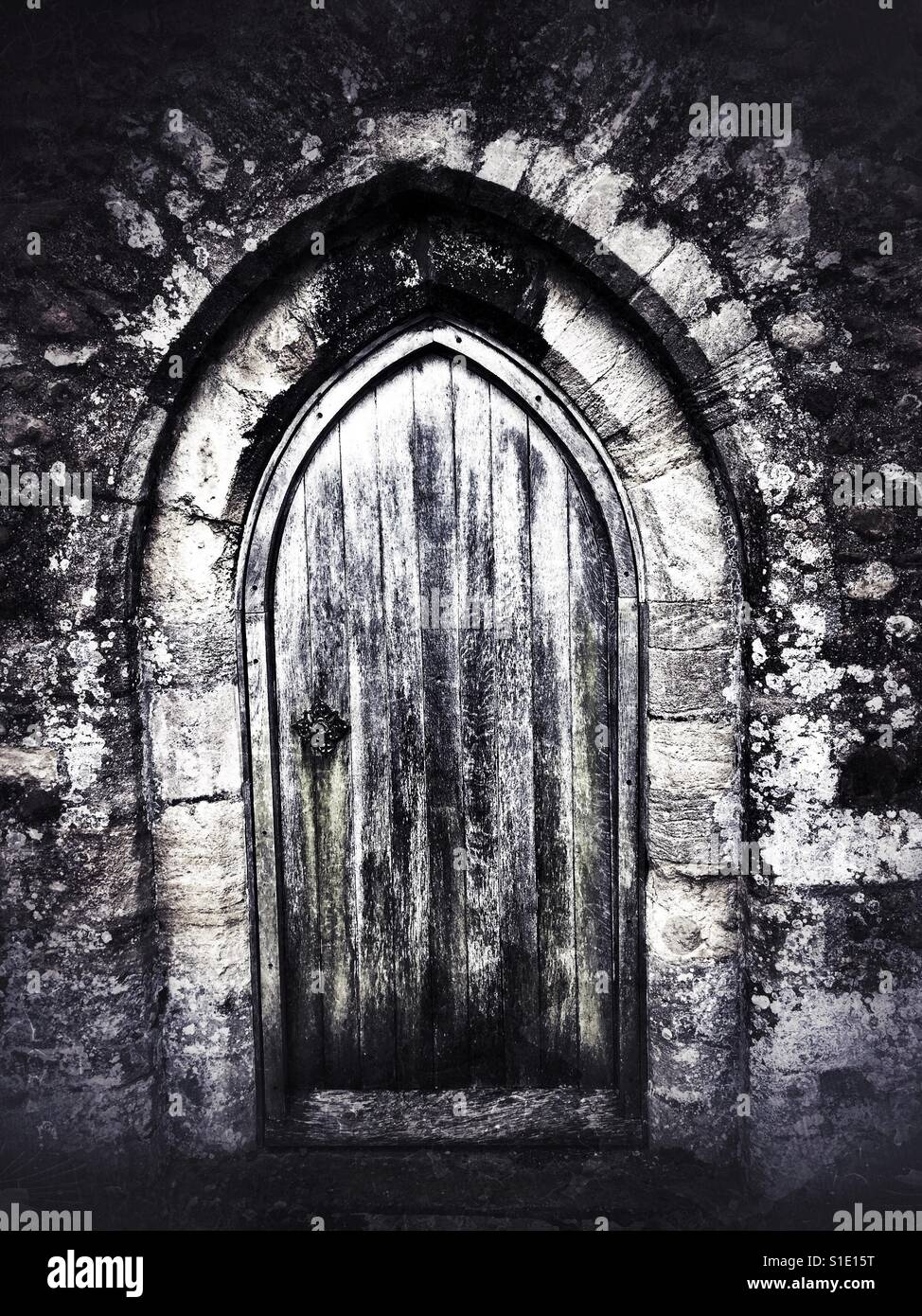 Medievale porta di legno. Foto Stock