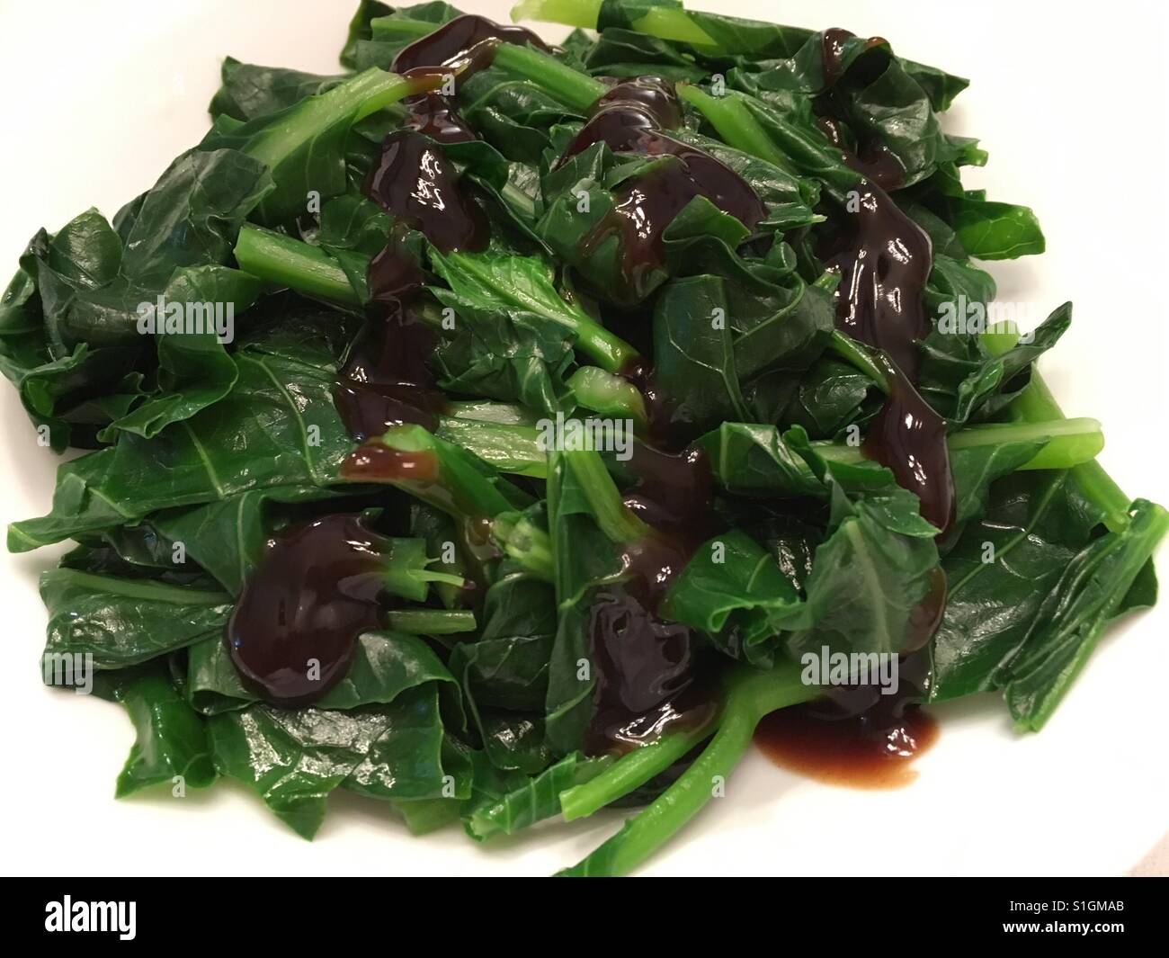 Bollito di broccoli cinesi Foto Stock