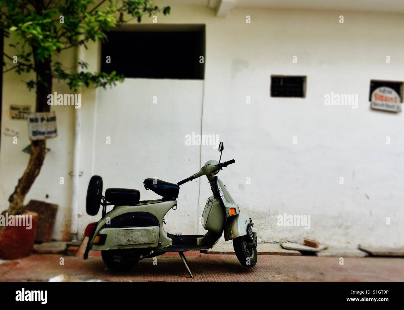 Lato strada leggenda scooter. Foto Stock