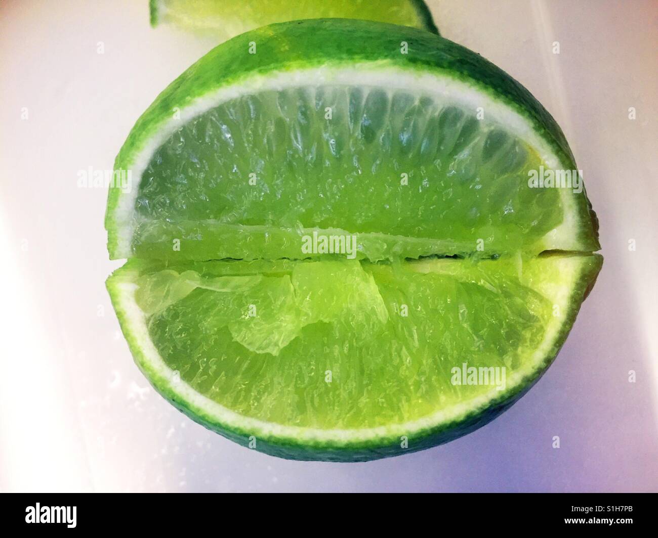 Close up di fresco fettine di lime Foto Stock