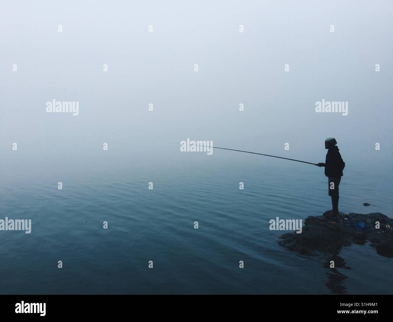 La pesca tra le nuvole. Foto Stock