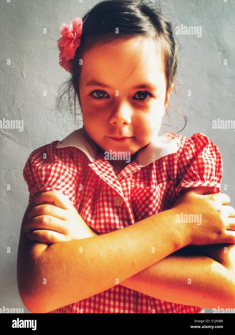 5 anni di moody schoolgirl Foto Stock