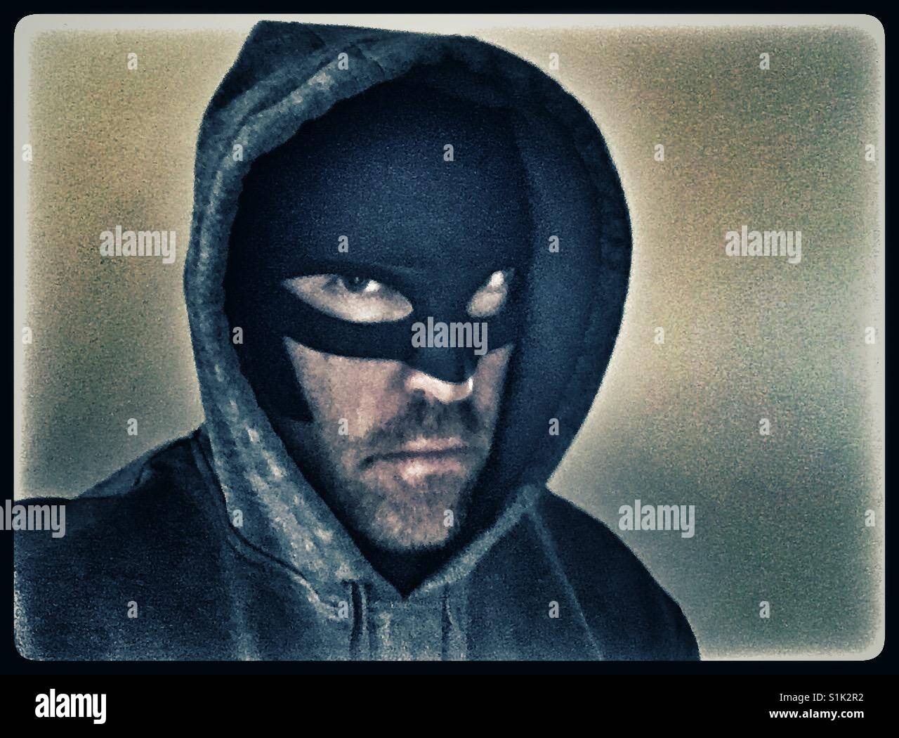 Batman barba lunga e indossare una felpa con cappuccio Foto stock - Alamy