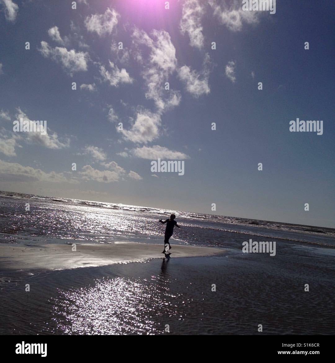 Silhouette a Blackpool Beach Foto Stock