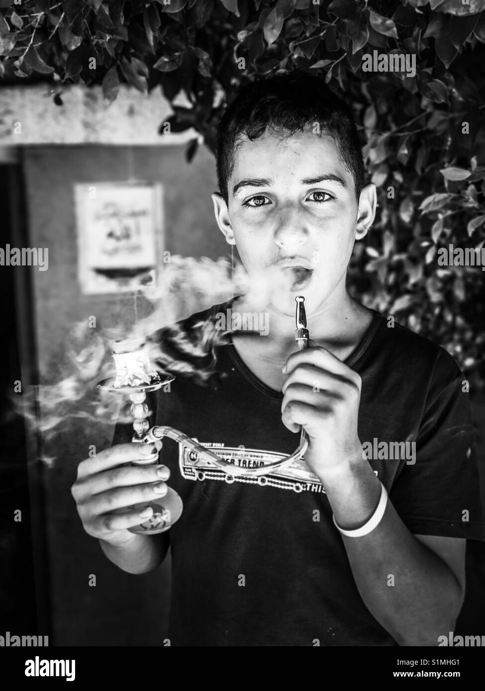 Un profugo palestinese in Aida Camp di Betlemme, Palestina. Foto Stock