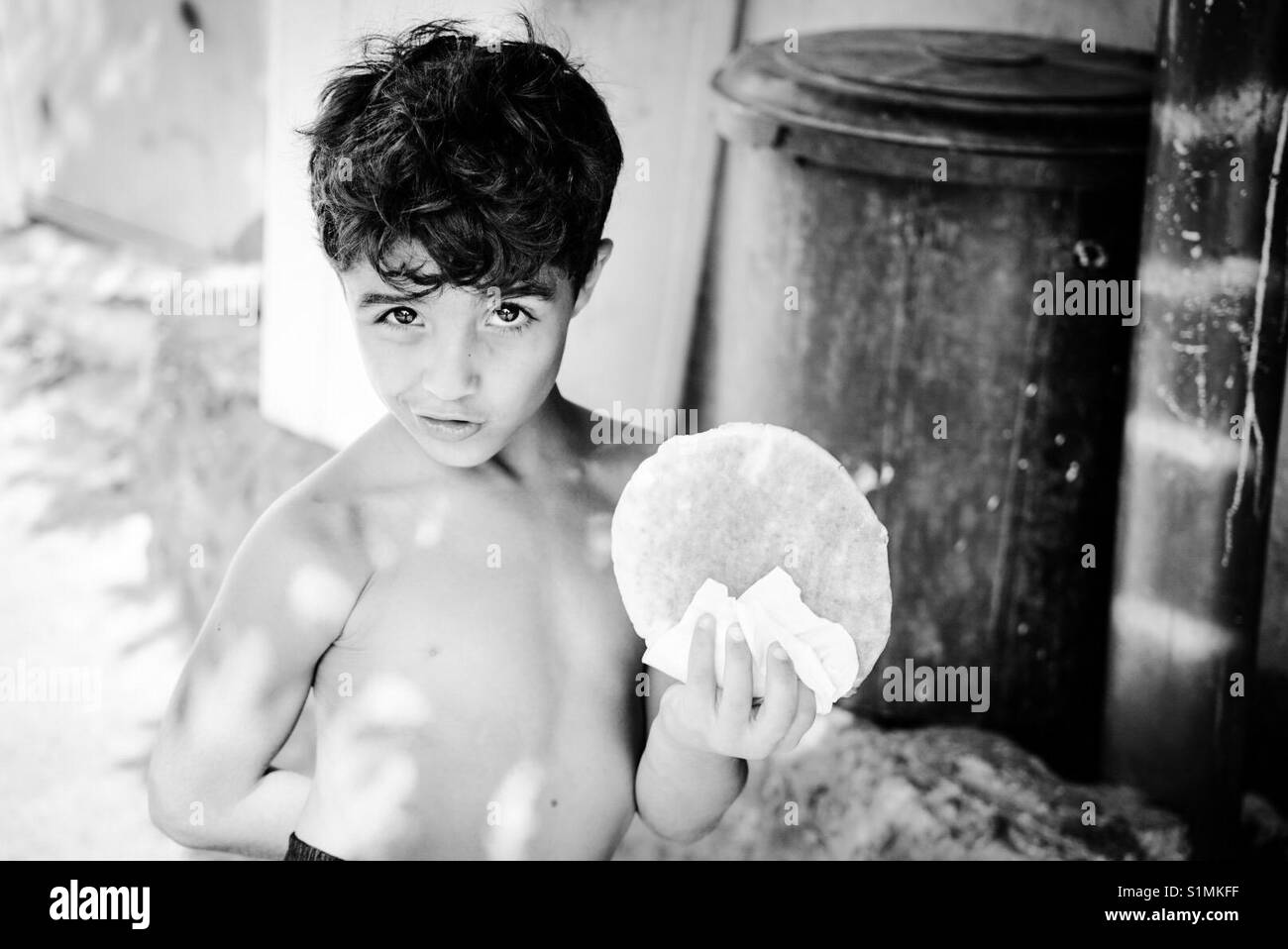 Un bambino profugo in Aida Camp di Betlemme, Palestina. Foto Stock
