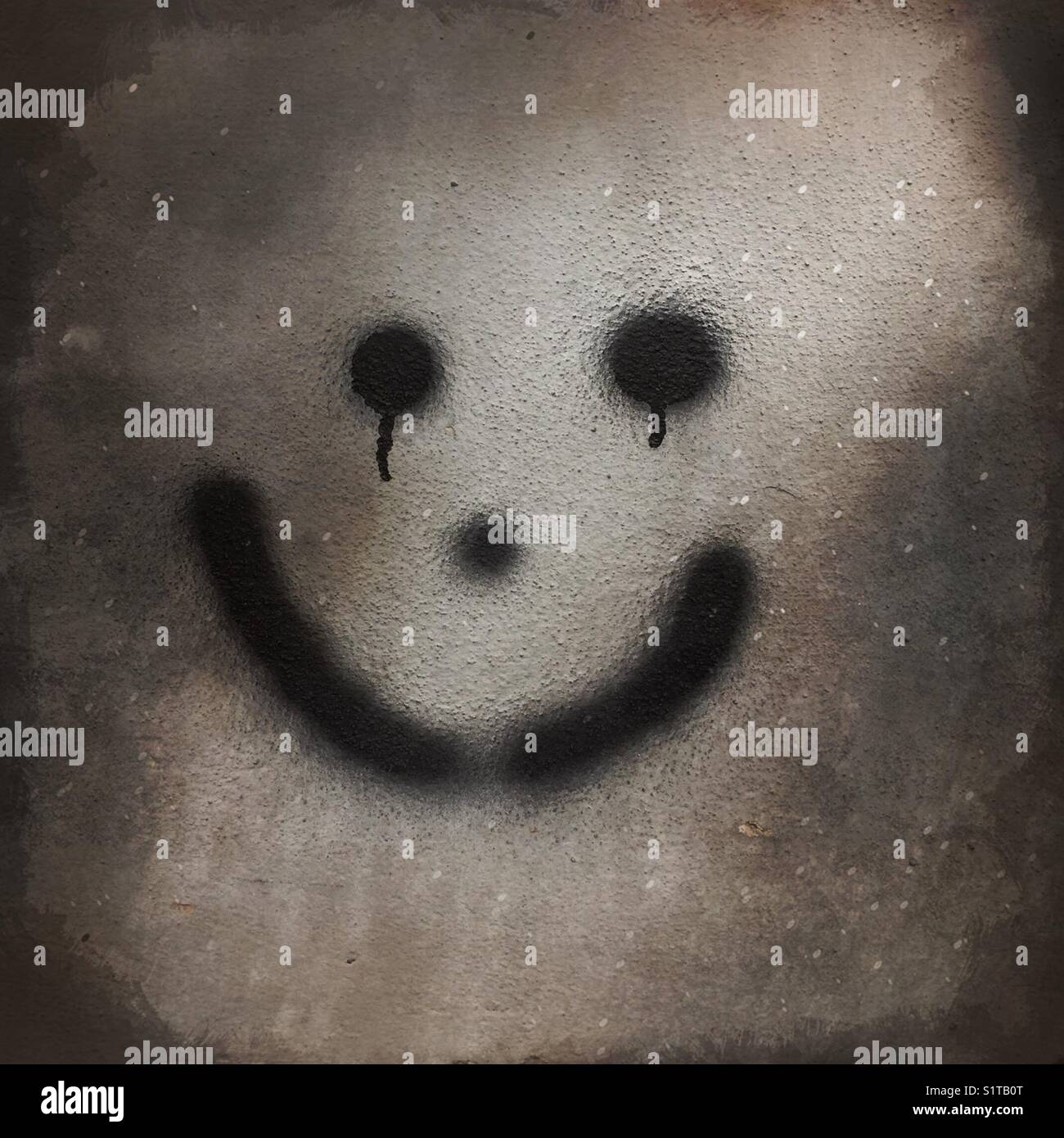 Smiley face graffiti Foto Stock