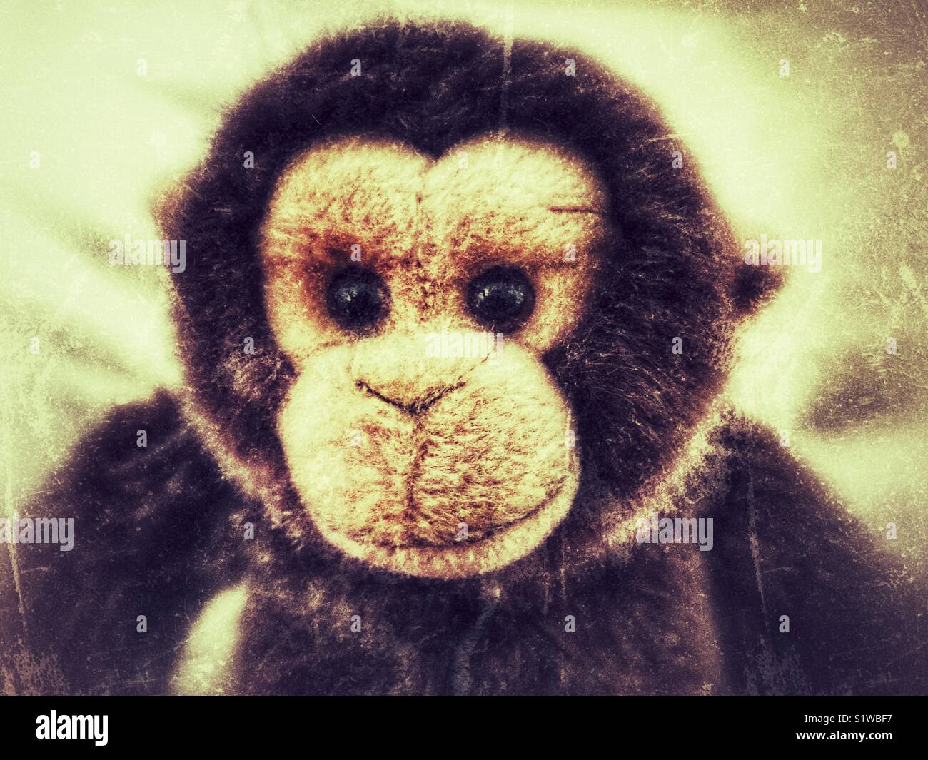 Bambino giocattolo, un peluche morbido monkey Foto Stock