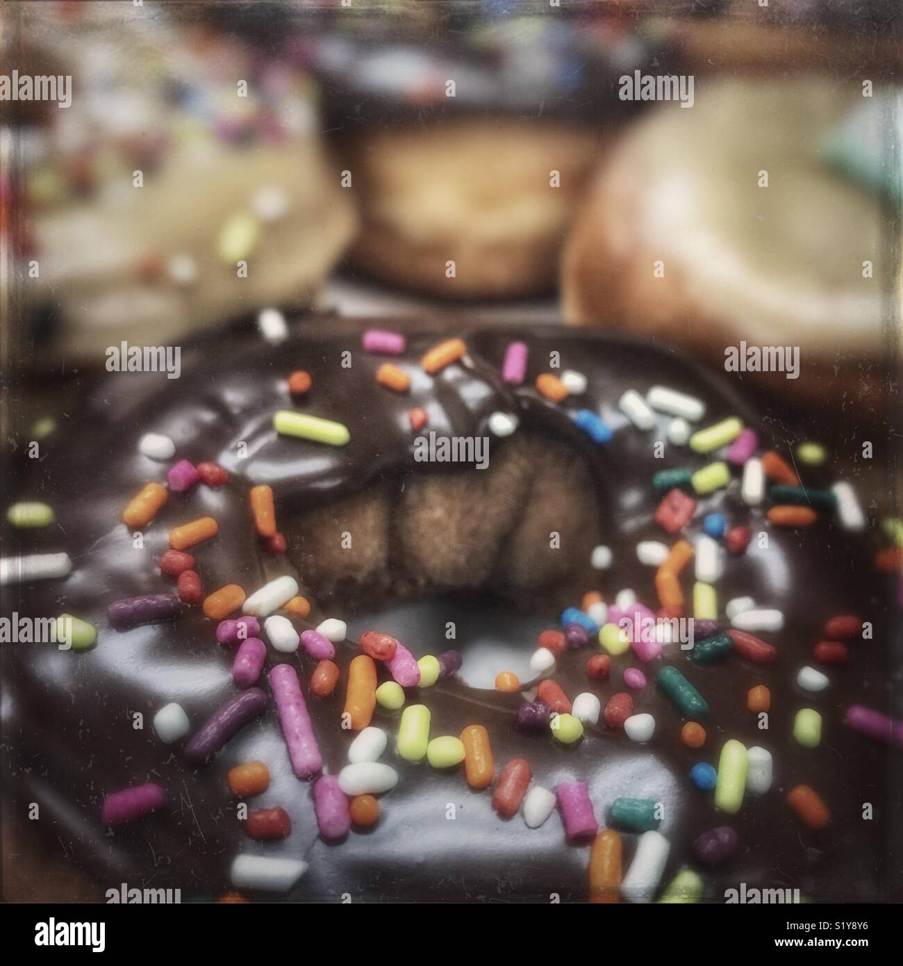 Cospargere le ciambelle Foto Stock