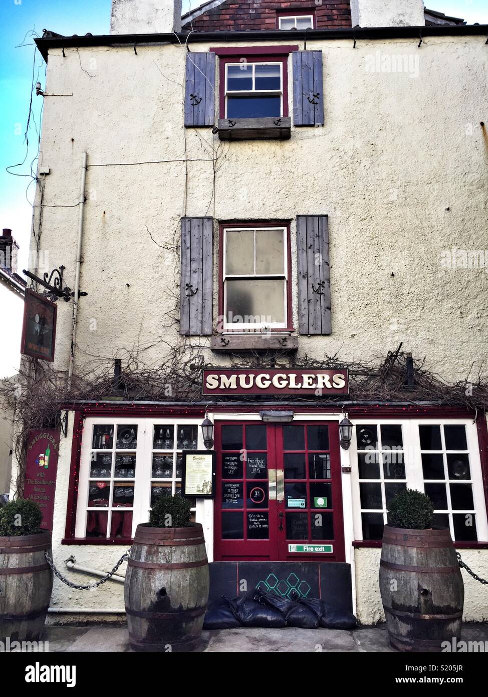 Smugglers pub di Robin Hood's Bay, North Yorkshire, Regno Unito, east coast Foto Stock