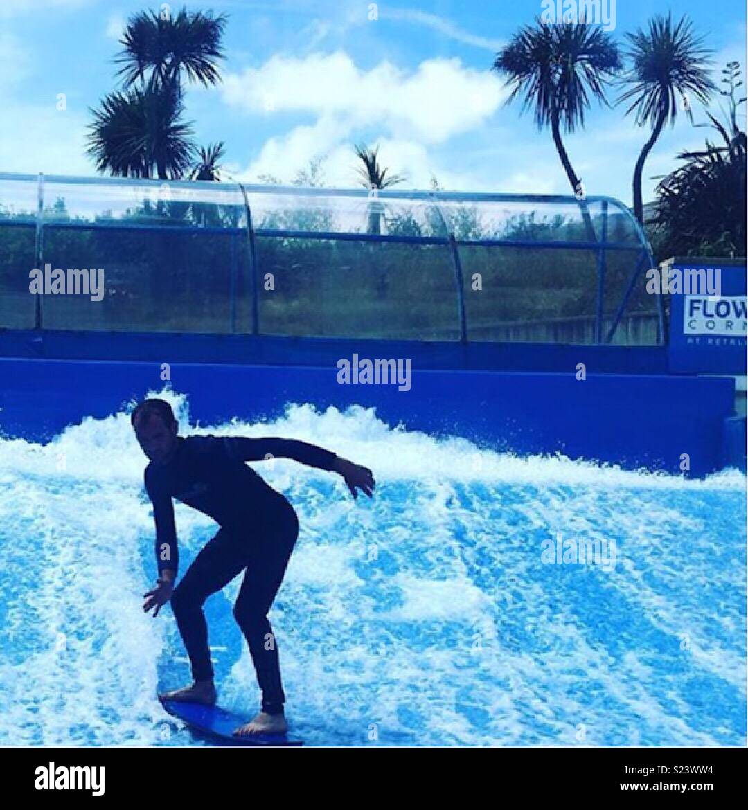 Uomo onda Surf Rider Foto Stock