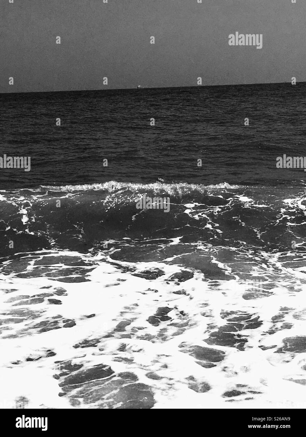 Schiumose acque del mare Foto Stock