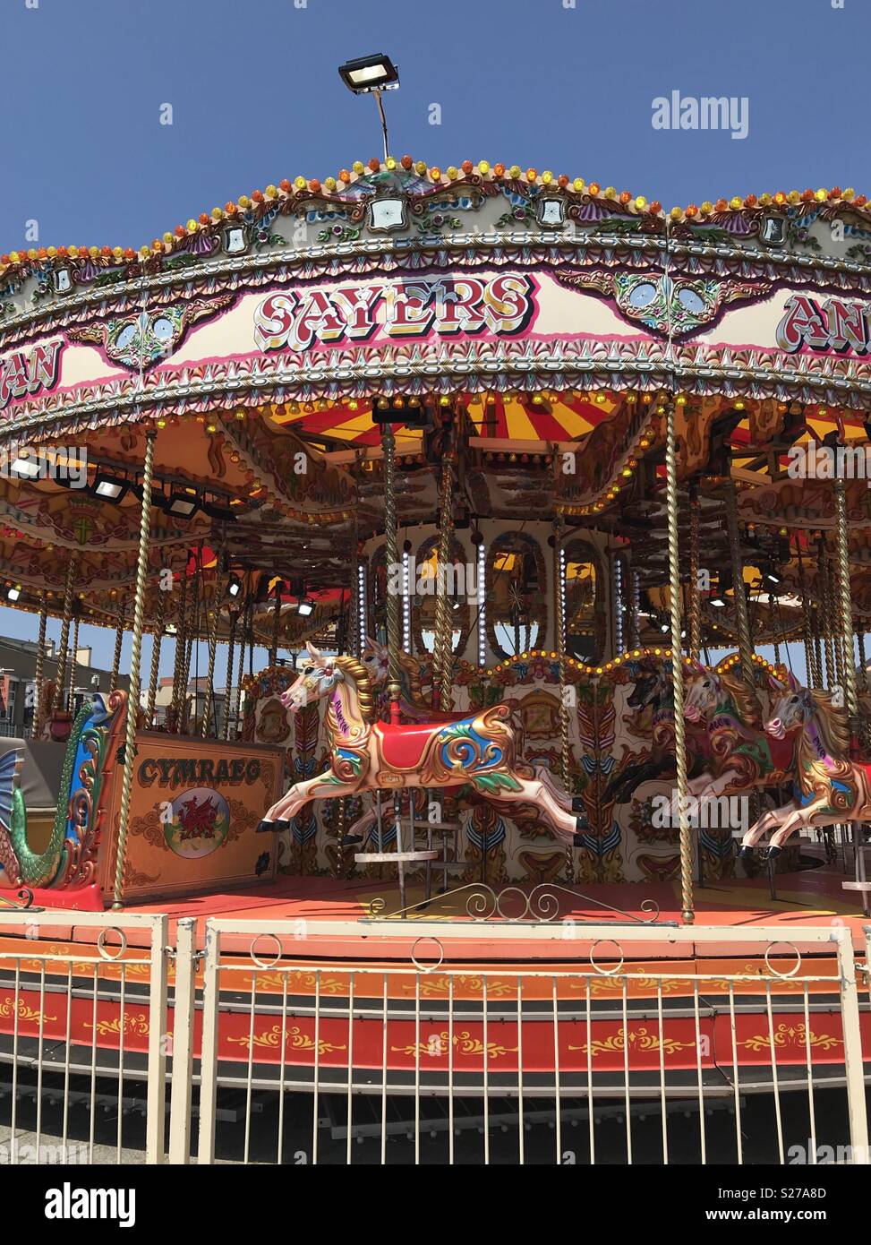 Giostra a Cardiff Bay, il Galles. Foto Stock