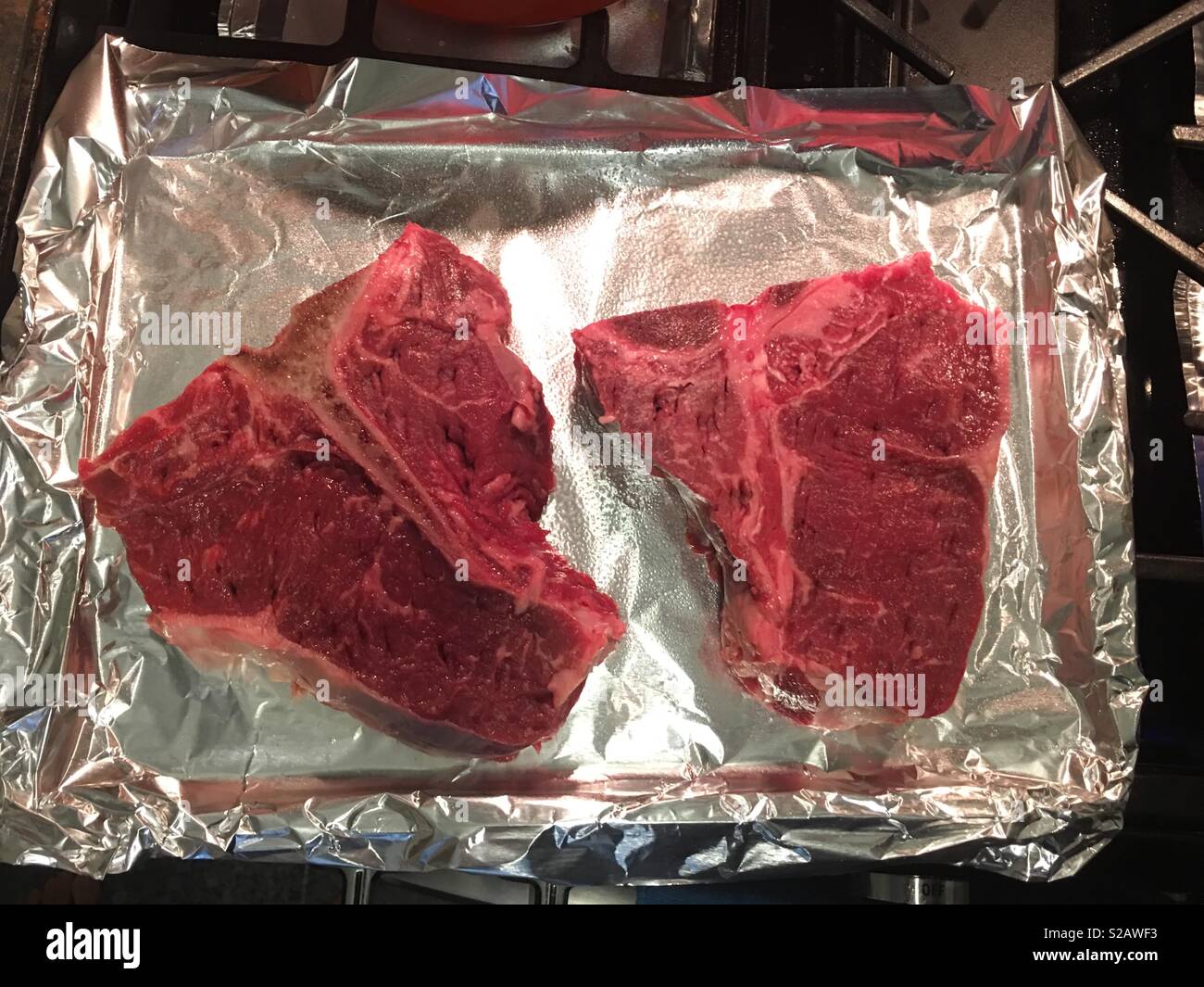 Due materie bistecche alla fiorentina - Immagine stock catturata con smartphone