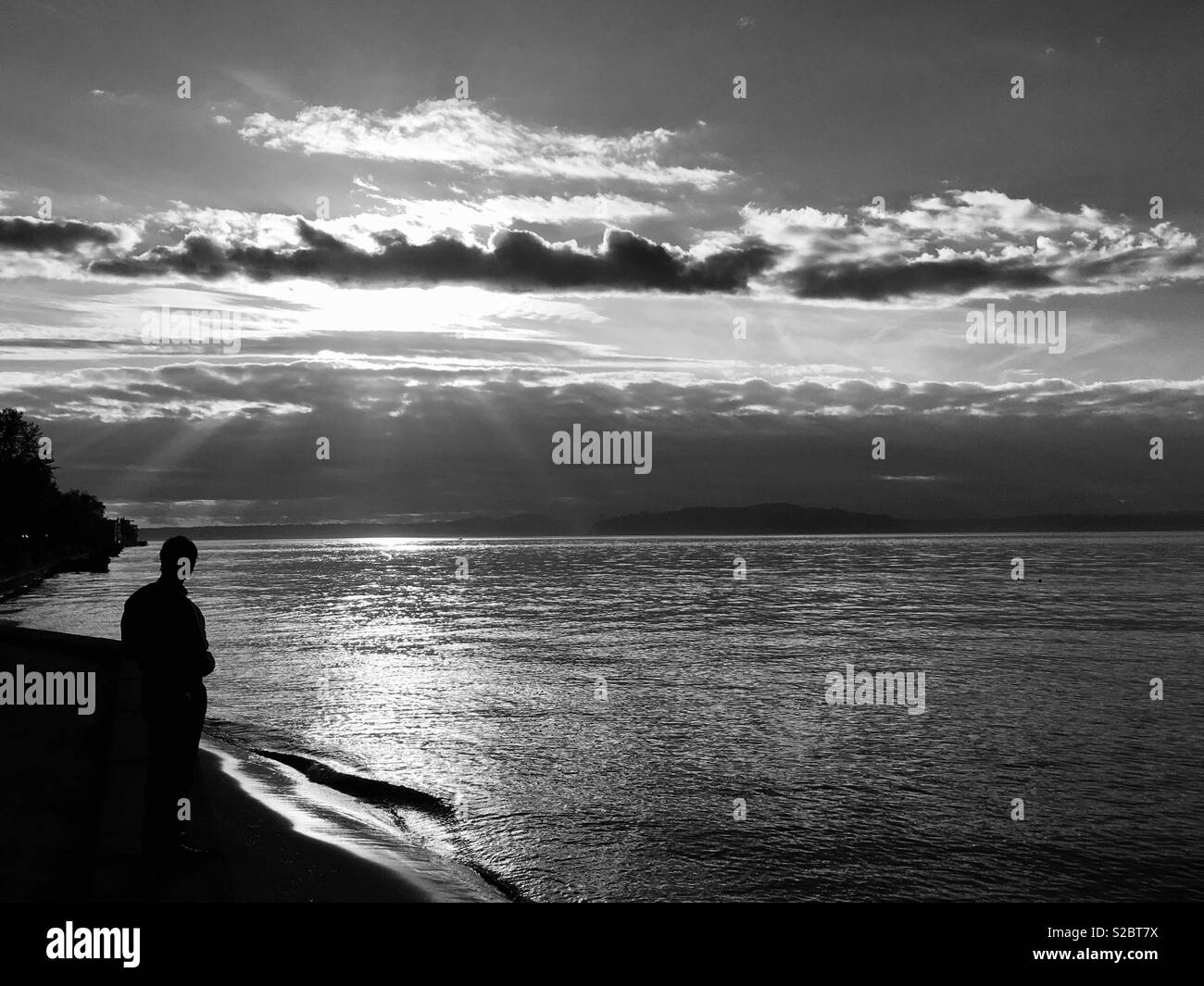 Spiaggia di Alki silhouette, Seattle WA Foto Stock
