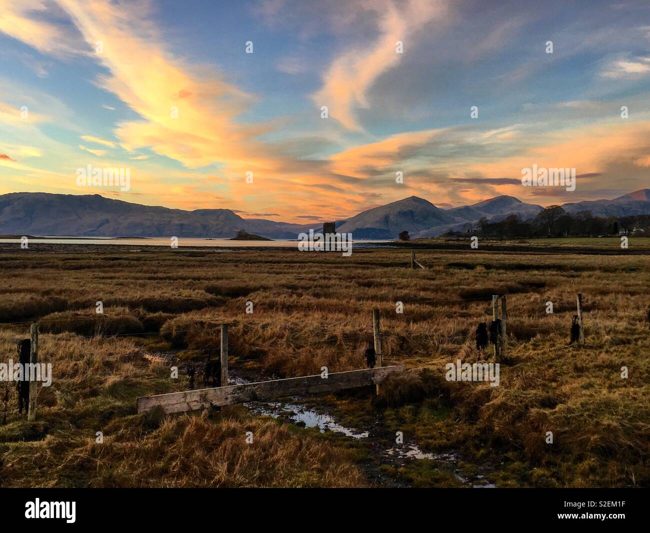 Castle Stalker tramonto Scozia Scotland Foto Stock