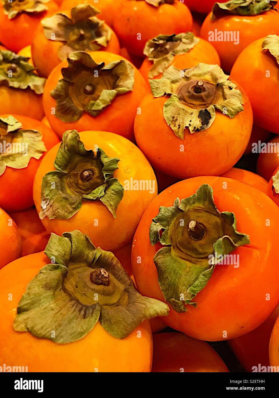 Fresche, mature, kaki - Immagine stock catturata con smartphone