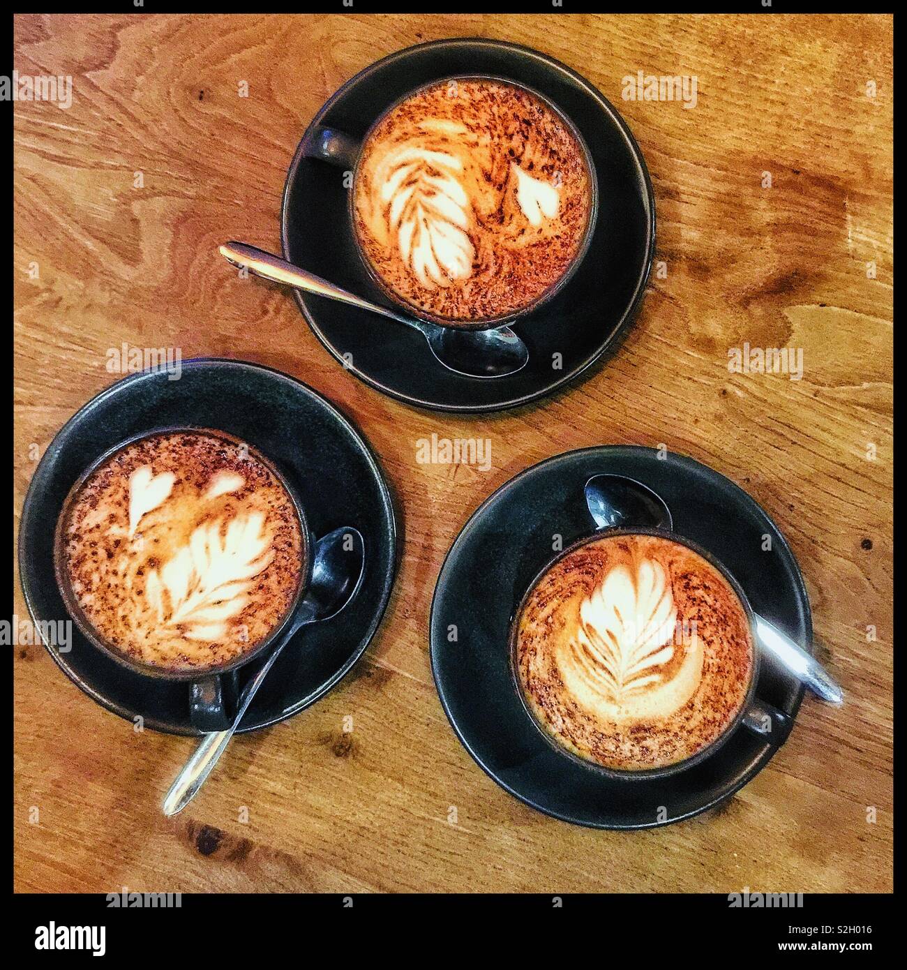 Tre tazze di caffè. Foto Stock
