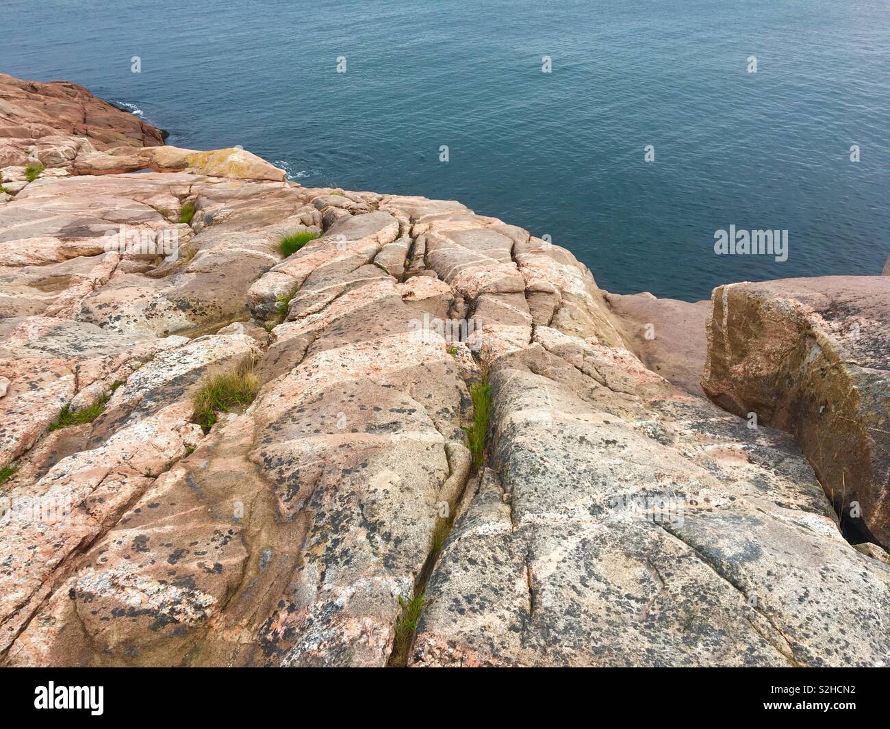 Rocce dall'oceano in Cape Breton Island in Canada Foto Stock