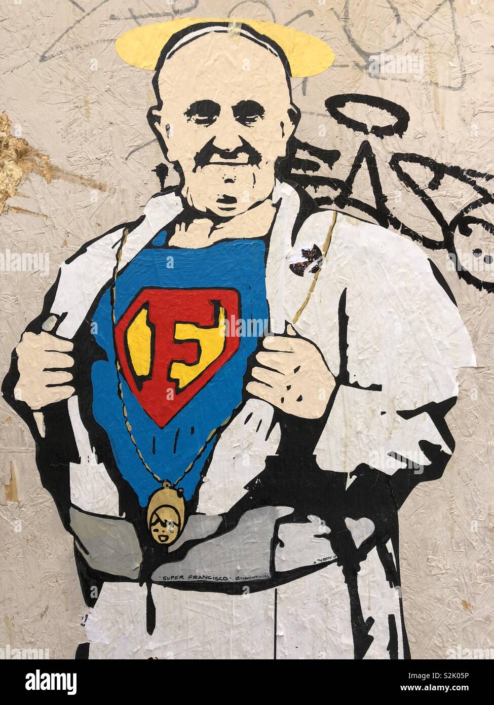 Super Papa, divertente graffiti su un muro di Roma Foto Stock