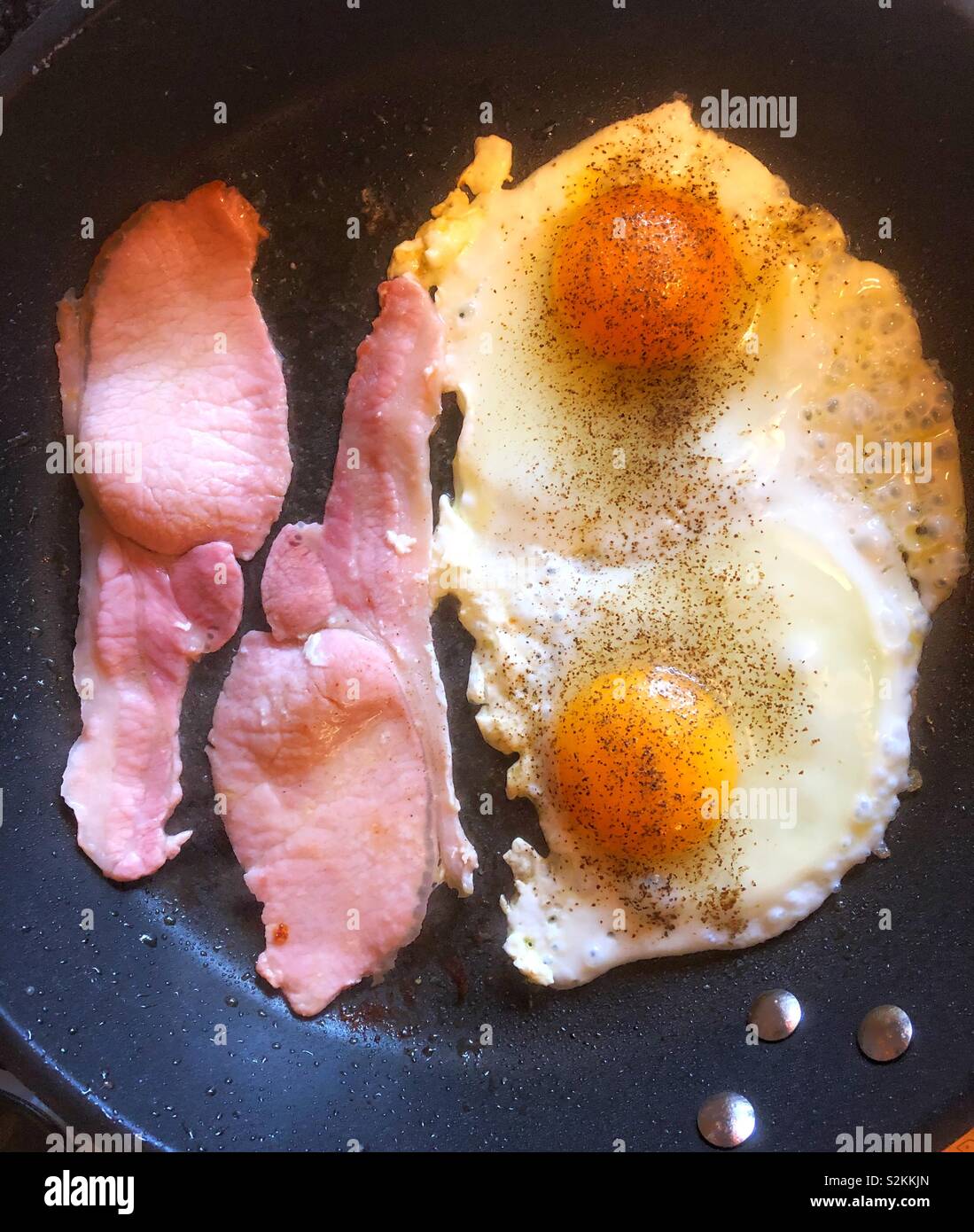 Uova e pancetta Foto Stock