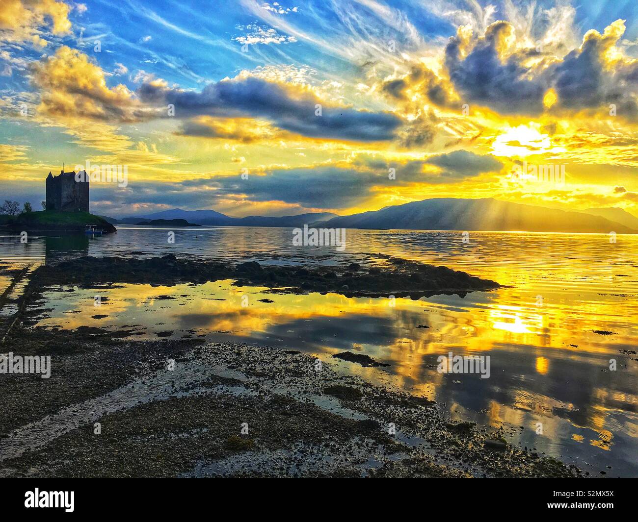 Castle Stalker tramonto, Appin. Foto Stock
