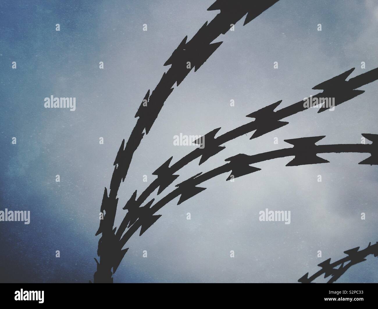 Silhouette di filo di concertina Foto Stock