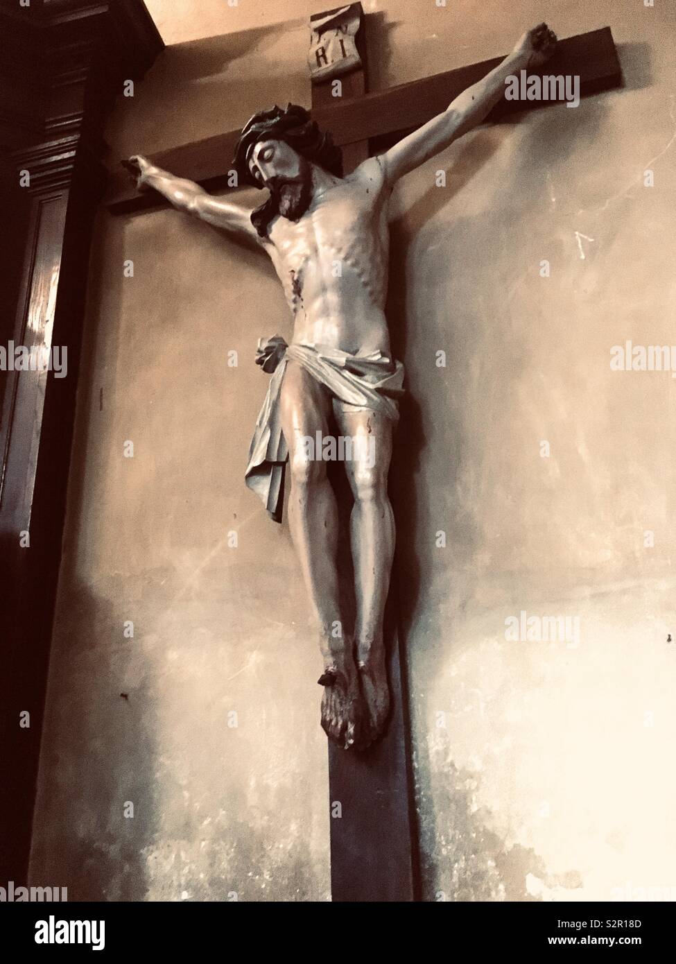 Gesù Cristo inchiodato alla croce, in una Chiesa in Polonia Foto Stock