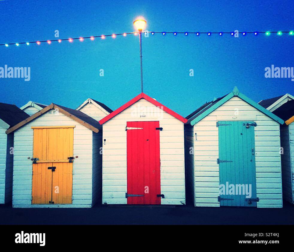 Serata di capanne sulla spiaggia Foto Stock
