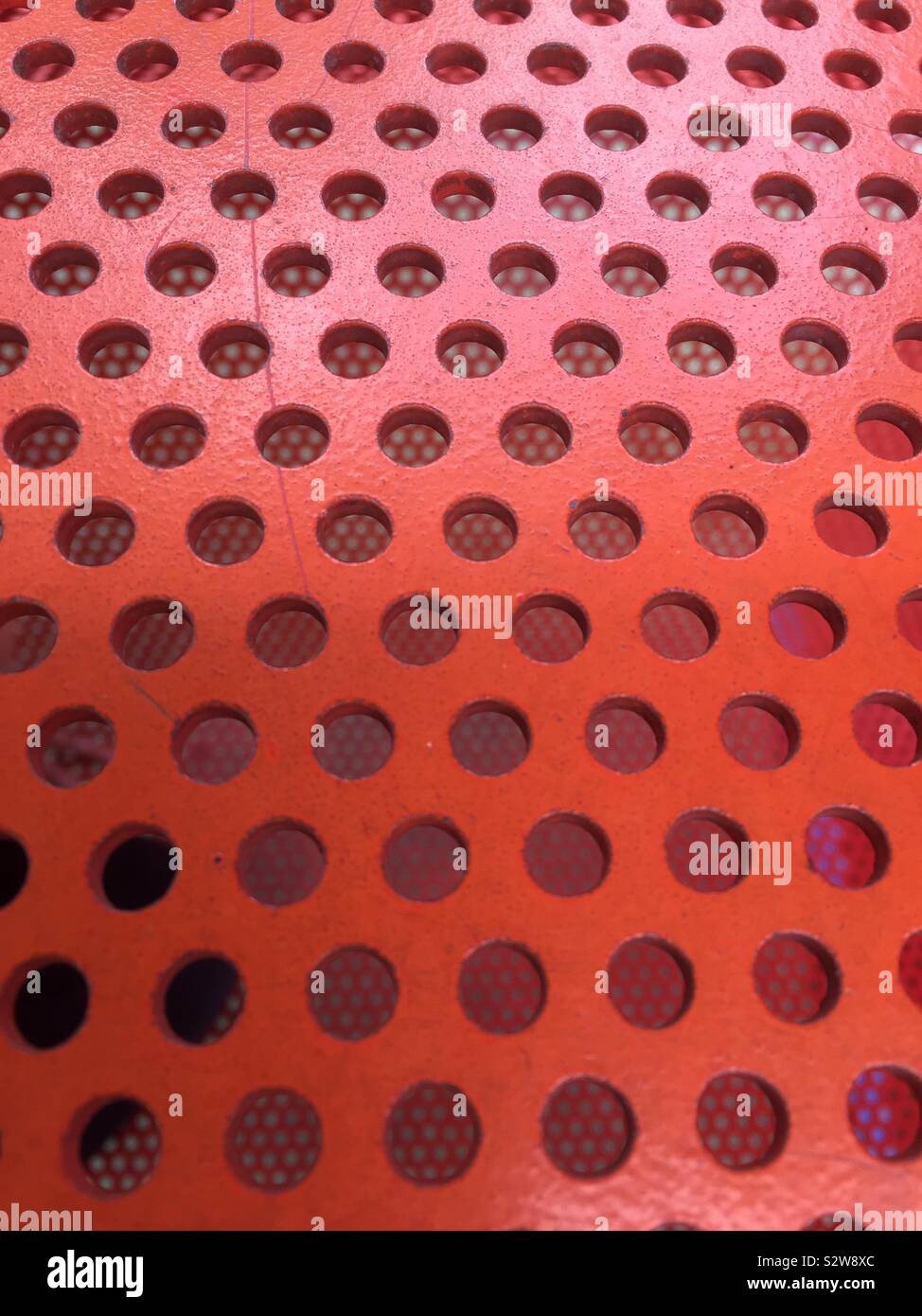 Cerchi di colore rosso metallo texture di sfondo Foto Stock