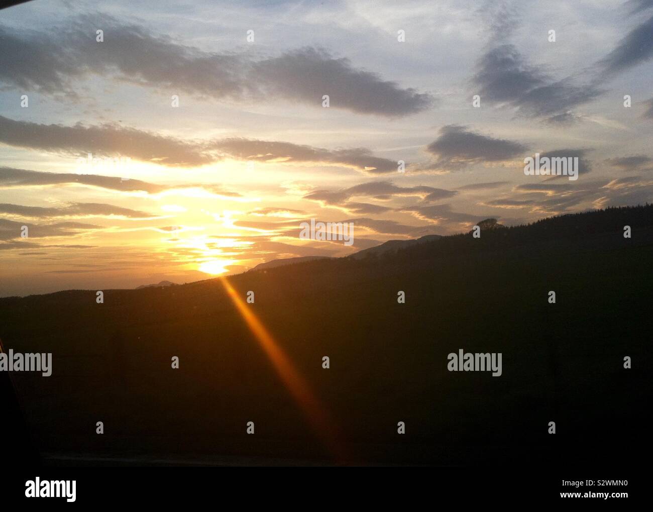 Sole al tramonto Foto Stock