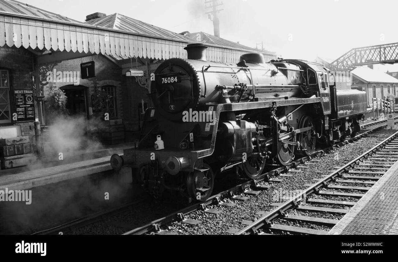 Treno a vapore, a Sheringham Station. Linea di papavero Foto Stock