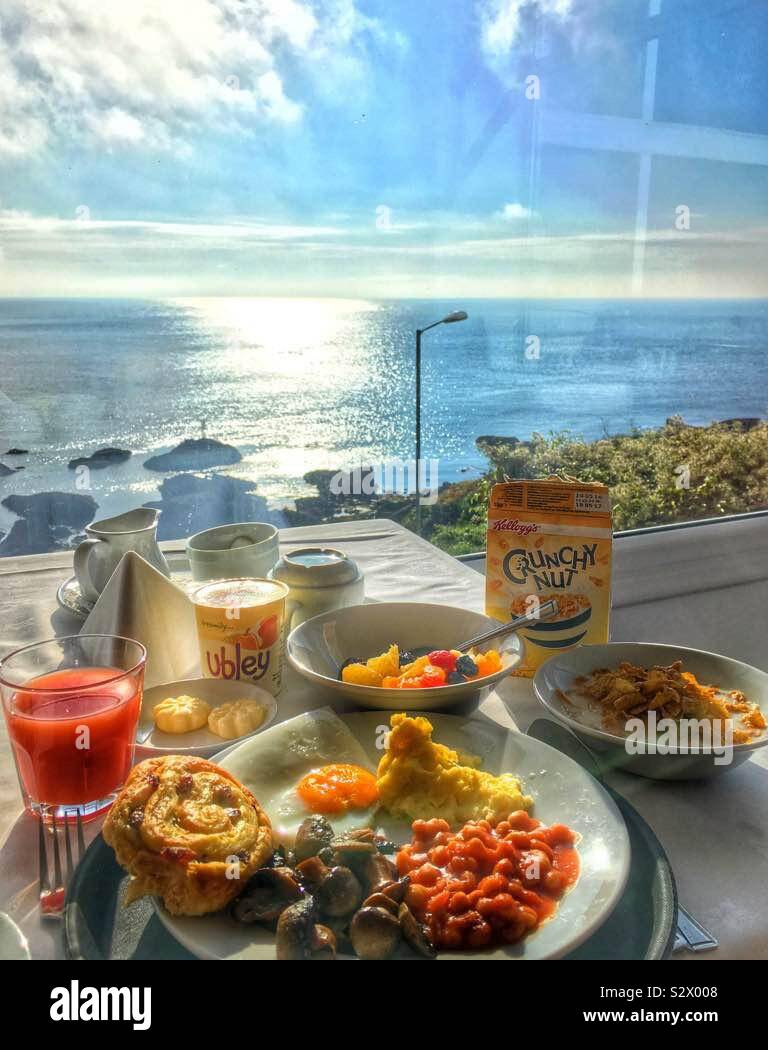 La colazione in riva al mare Foto Stock