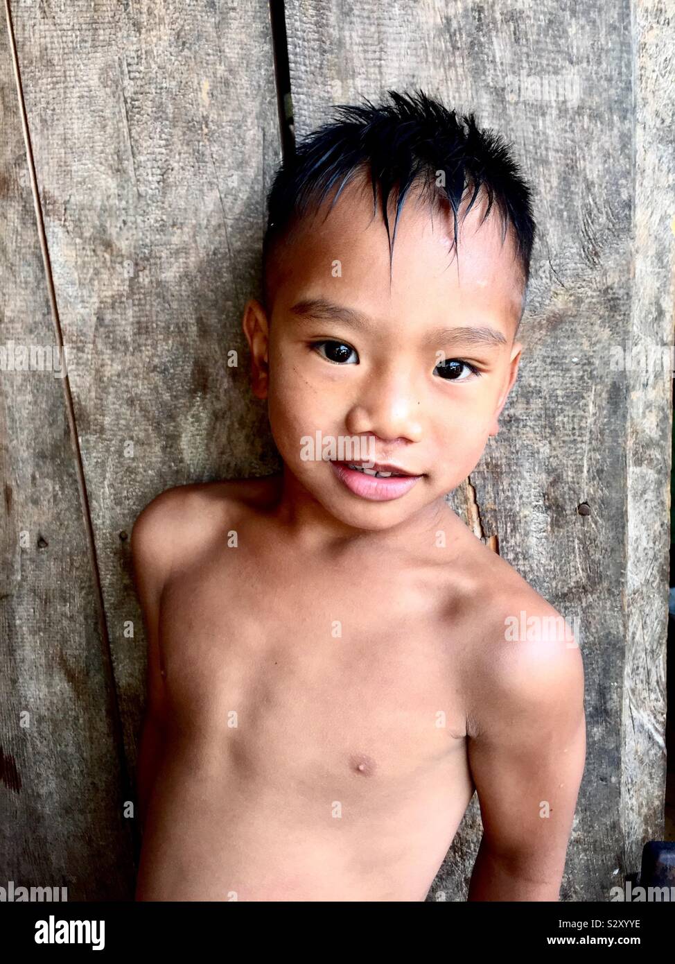 Un ragazzino dalla tribù Butbut in Buscalan, Filippine. Foto Stock