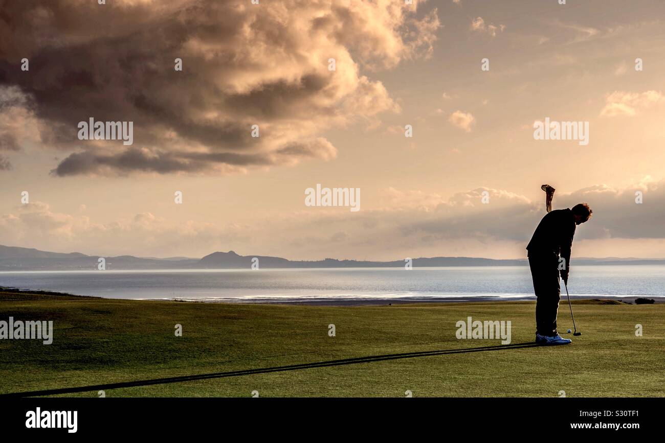 Il golfista e il cloud computing Foto Stock