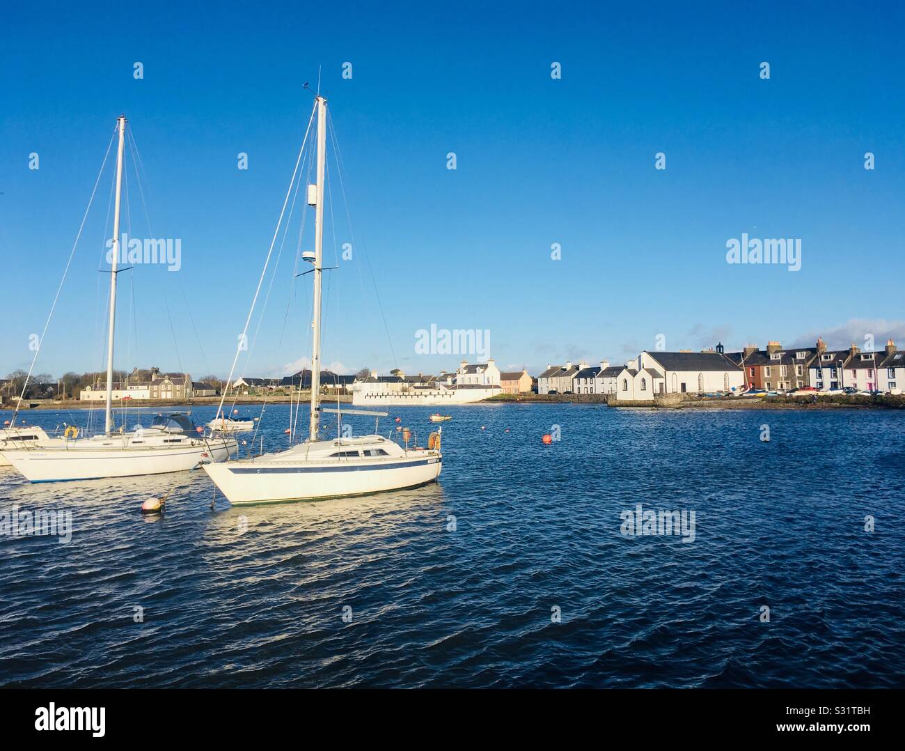 Barche a vela ormeggiata in porto a Isola di Whithorn, Dumfries and Galloway, Scozia Foto Stock