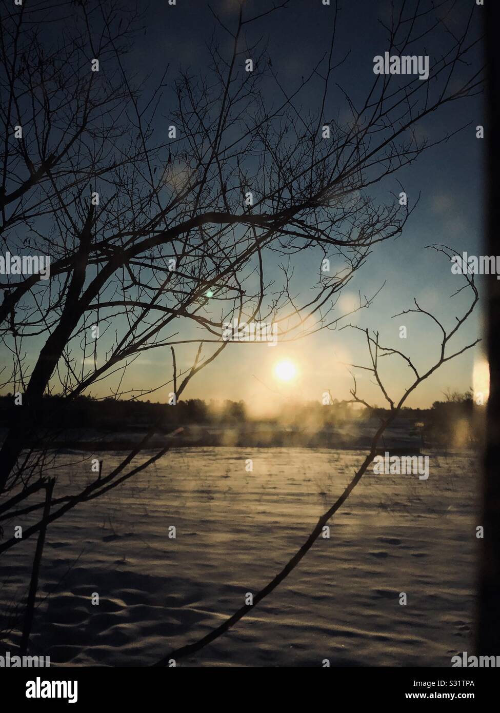 Sun attraverso una finestra nel Maine. Foto Stock